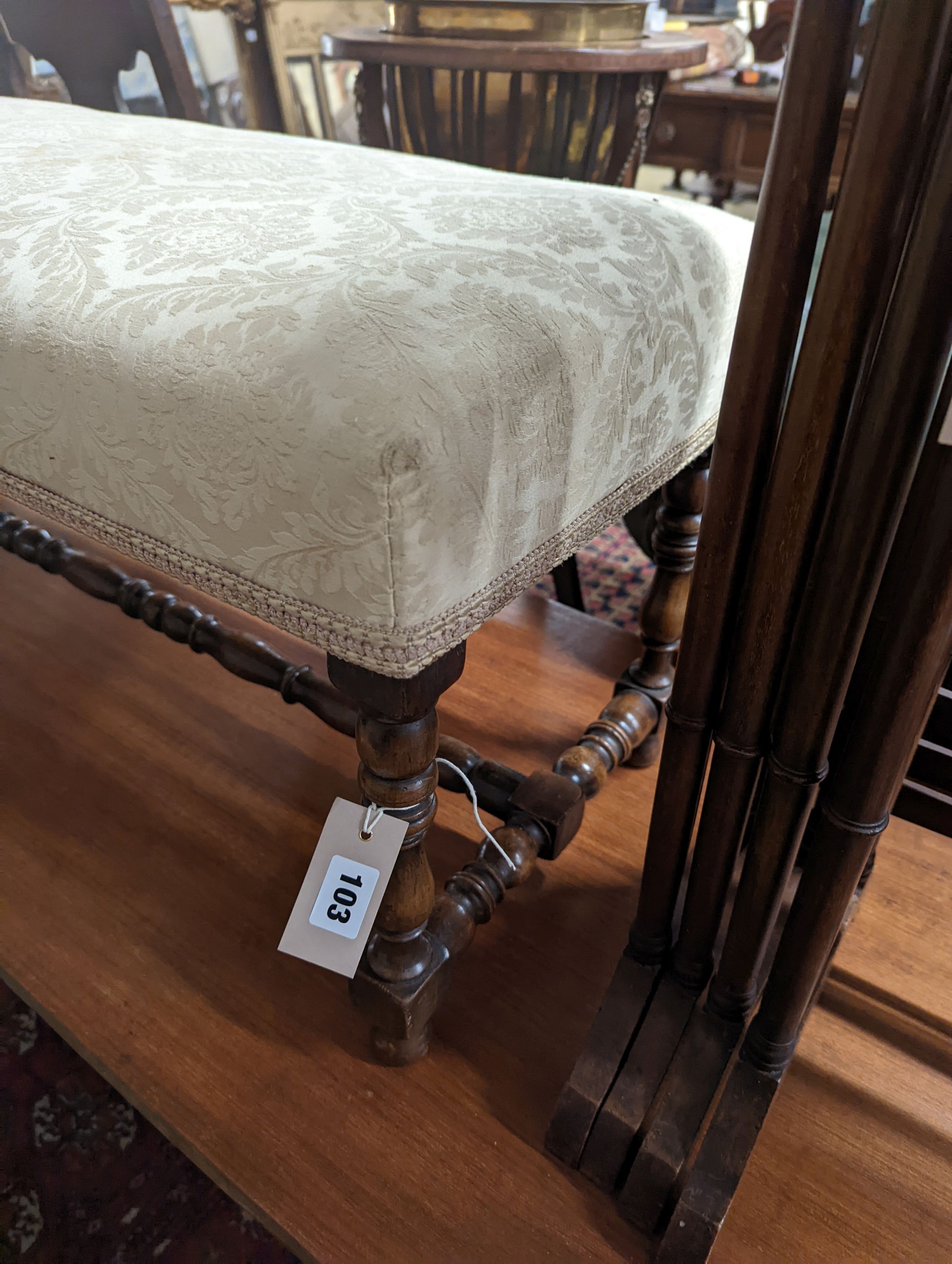 A 1920's turned mahogany window seat, length 98cm, depth 36cm, height 40cm